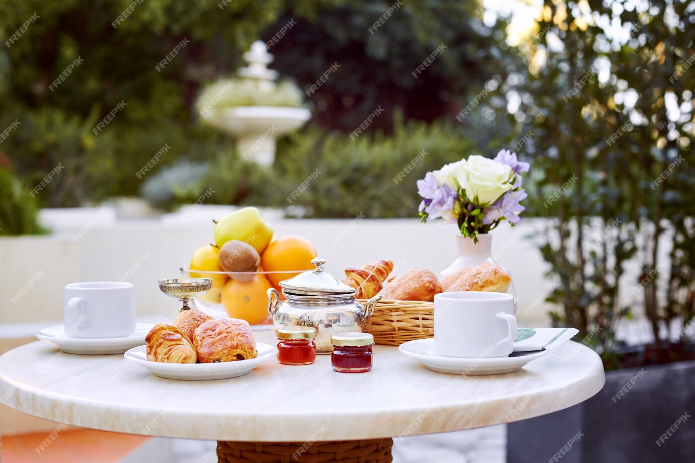 Breakfast spread with pastries and fruit